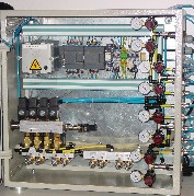 Control center piloted by programmable controller : large flow lubrication for following tool, synchronised with the press and automatic filling up of the reservoir.