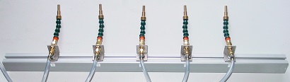 Rack of coaxial microlubrication nozzles